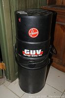 Front view of Hoover Garage Utility Vacuum showing Hoover logo and GUV branding