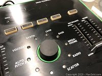 Close-up front panel showing preset buttons, central knob and effect labels