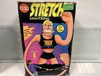 Original Stretch Armstrong box with colorful graphics and stretching claims