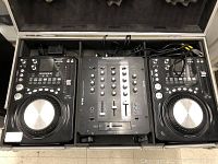 Open flight case with one mixer and two CD players