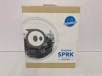 Front view of the Sphero SPRK Edition box showing the robot inside with clear polycarbonate shell.