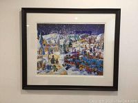 Overall view of framed print hung on wall