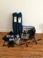 Overview of all items in lot against white wall