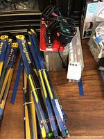 Photo of new Goodyear windshield wipers in packaging showing sizes ranging from 16 to 28 inches along with Battery Tender charger on top of box.