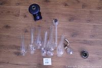 Overview photo showing the cobalt blue base, multiple glass chimneys, and small bases with burner parts.