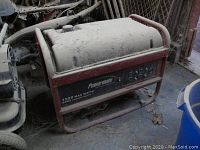 Side view of Powermate generator showing 7500 max watts and 6000 running watts label and outlets.