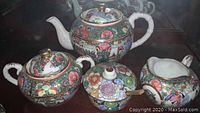 Floral pattern china tea set with lid and creamer