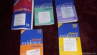Front covers of six Clinical Evidence books with blue-themed covers and various volume numbers and editions visible.