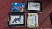 Photo of four various decorative picture frames with animal themes.
