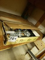 Boxed Somax vise on shelf showing original packaging and lot sticker