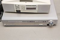 Panasonic SA-H1720 DVD player front view showing buttons and knob