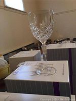 Single Waterford Markham white wine glass on its original box.