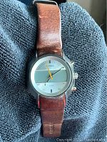 Front view of Diesel watch showing the dial, brand, and condition of the leather strap