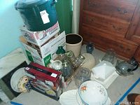 Overview of lot showing bowls, jars, crock, cutting boards, carafe, and stock pot.