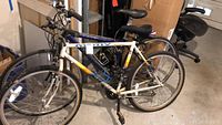 Two GT Avalanche mountain bicycles side by side showing overall condition, frame, tires, and components
