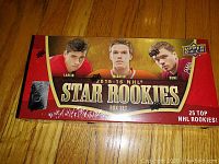 Front view of sealed 2015-16 Upper Deck NHL Star Rookies box set showing images of three hockey players and branding.