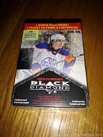 Front view of sealed 2013-14 Upper Deck Black Diamond hockey wax box with player in Edmonton Oilers uniform