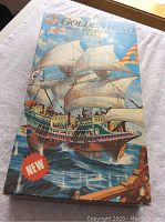 Top of original Airfix Golden Hind model kit box with colorful illustration of the ship and new sticker.