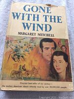 Front cover of the book showing the title, author, and illustrated dust jacket with portraits and historical scenes.