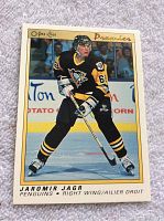 Front view of the 1990-91 OPC Premier Jaromir Jagr rookie hockey card showing action shot and text details.