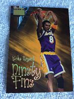 Front view of the Kobe Bryant Ninety Fine basketball card showing a dunking action shot.