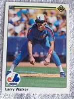 Front side of the Larry Walker 1990 Upper Deck rookie card, showing photo and design details.