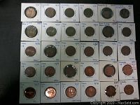 Front view showing Canadian 1 cent coins mounted in cardboard holders, marking dates and condition of coins from 1938 to 1996.