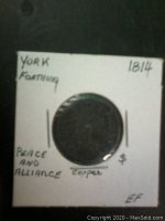 Front side of the 1814 British York Farthing copper coin showing details and annotations on holder including year, location, motto, metal, and grade EF.