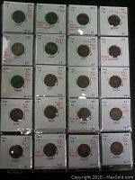 First photo of 20 coins each in protective holders with handwritten annotations providing coin year, variety, and condition details, primarily from the 1930s to 1940s.