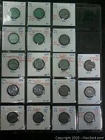 First photo shows the first 16 coins arranged in 4 rows of 4 with detailed notes on variations and condition grades on white holders.