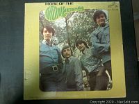 Front cover of 'More Of The Monkees' LP album showing the band members and album title.