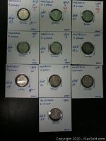 Full view of all 10 Australian 3 Pence coins individually protected in holders, showing dates 1943, 1944, 1948, 1949, 1952, 1961 and mint marks and grading notes.