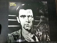 Front cover of the Peter Gabriel self titled vinyl album with distorted black and white photo of the artist's face