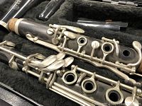 Close-up image of Bundy clarinet body showing silver keys and wood body.