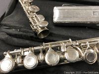 Close-up of flute keys and end section showing condition and craftsmanship