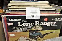 Photo showing stacked vintage LP albums including The Lone Ranger Western Series No. 3 album with cover art of Lone Ranger holding a gun.