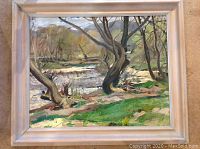 Frontal view of oil painting 'Humber Spring' by H.B. Caulfield in frame