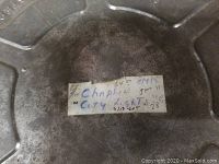 Close-up of the handwritten label on the metal reel canister reading "Chaplin City Lights" with additional handwritten numbers and notes.