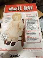 Front of the sealed vintage doll kit box showing the image of the completed doll and kit details.