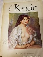 Front cover of the book showing a Renoir painting of a seated woman draped with a white cloth, partially nude, with the title 'Renoir' and text indicating 16 full-color prints inside.