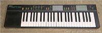 Full view of Yamaha PSR 12 keyboard showing all keys and control panel