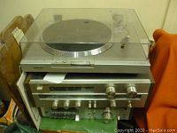 Front view of stacked turntable, receiver and cassette deck