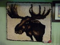 Front view of the hand made moose head rug showing detailed texture and coloration