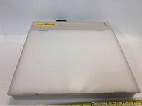 Front view of the Artograph Light Tracer light box showing the translucent light surface and logo in the top left corner.