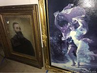 Both framed prints side by side on floor