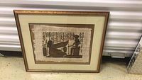 Frontal view of framed Egyptian tapestry showing detailed ancient design and hieroglyphics.