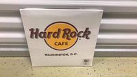 Photo of the T-shirt packaging showing Hard Rock Cafe Washington, D.C. logo.