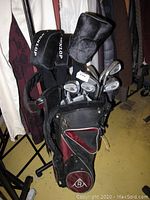 Photo showing full Dunlop golf bag filled with Pro Comp left-handed clubs and three club covers.