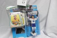 Full view of Wayne Gretzky action figure packaging with hockey cards in plastic bag attached.