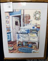 Framed print of kitchen scene with vintage stove and homey details, matted and framed in wood